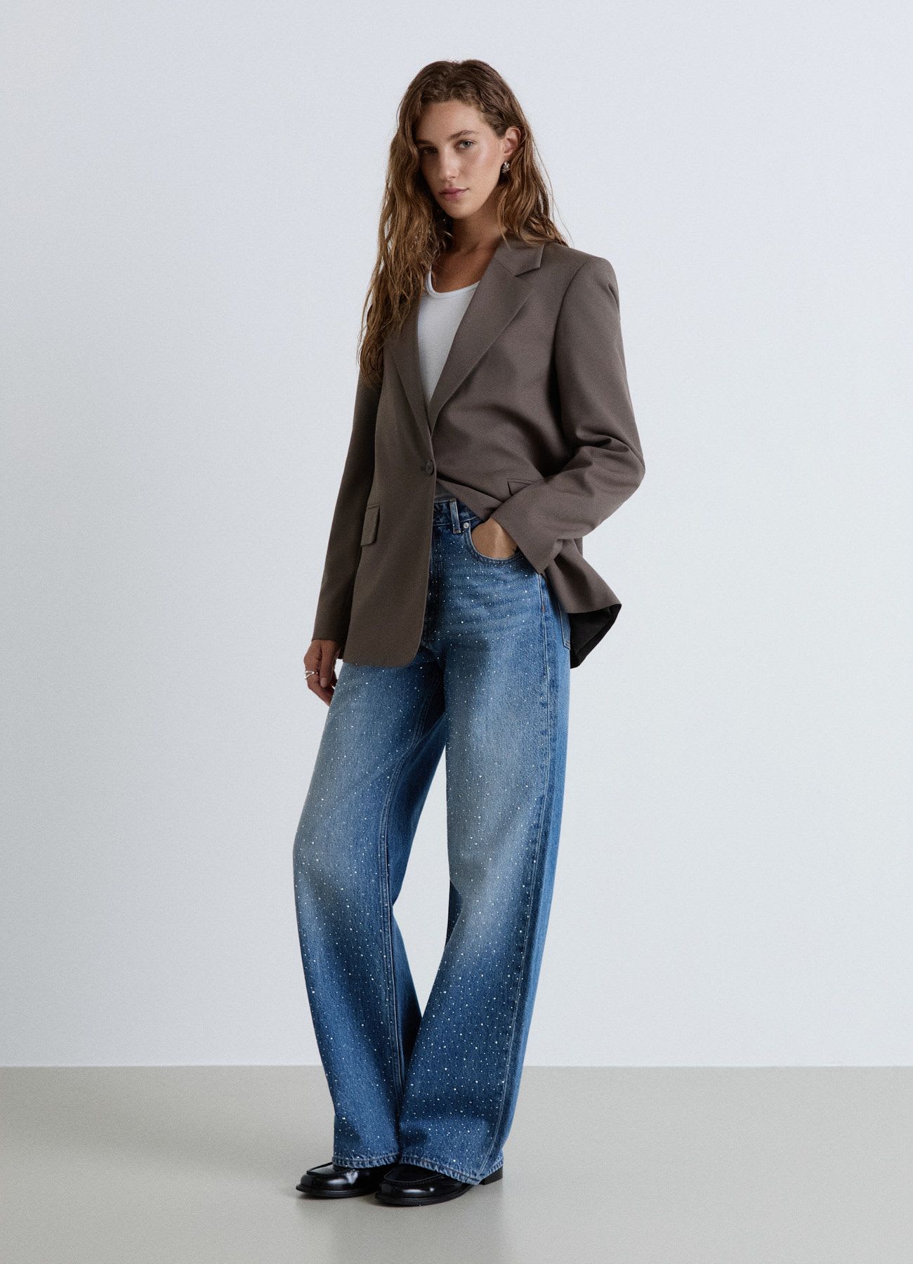 Jeans wide leg con strass