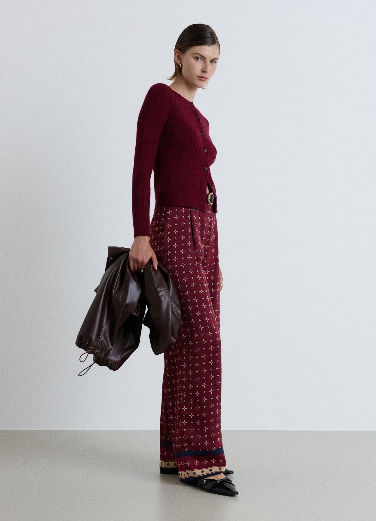 Cardigan a trecce con bottoni