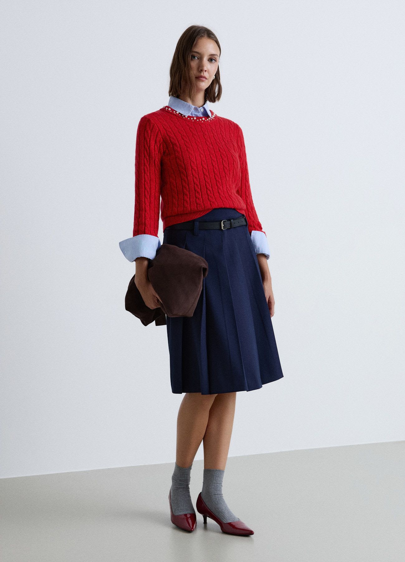 Maglia a trecce con perle