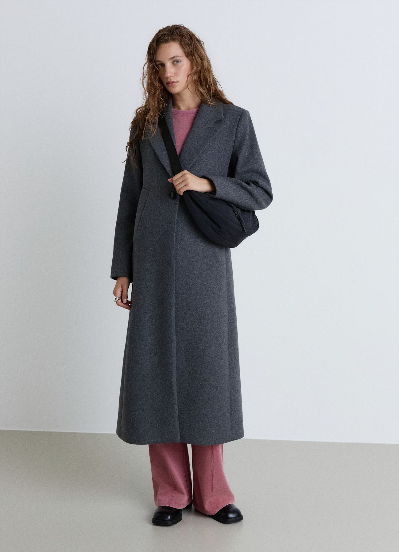 Cappotto lungo con chiusura a un bottone