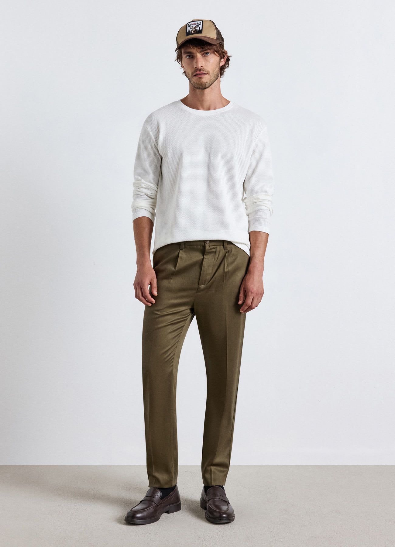 Pantaloni chino slim a tinta unita