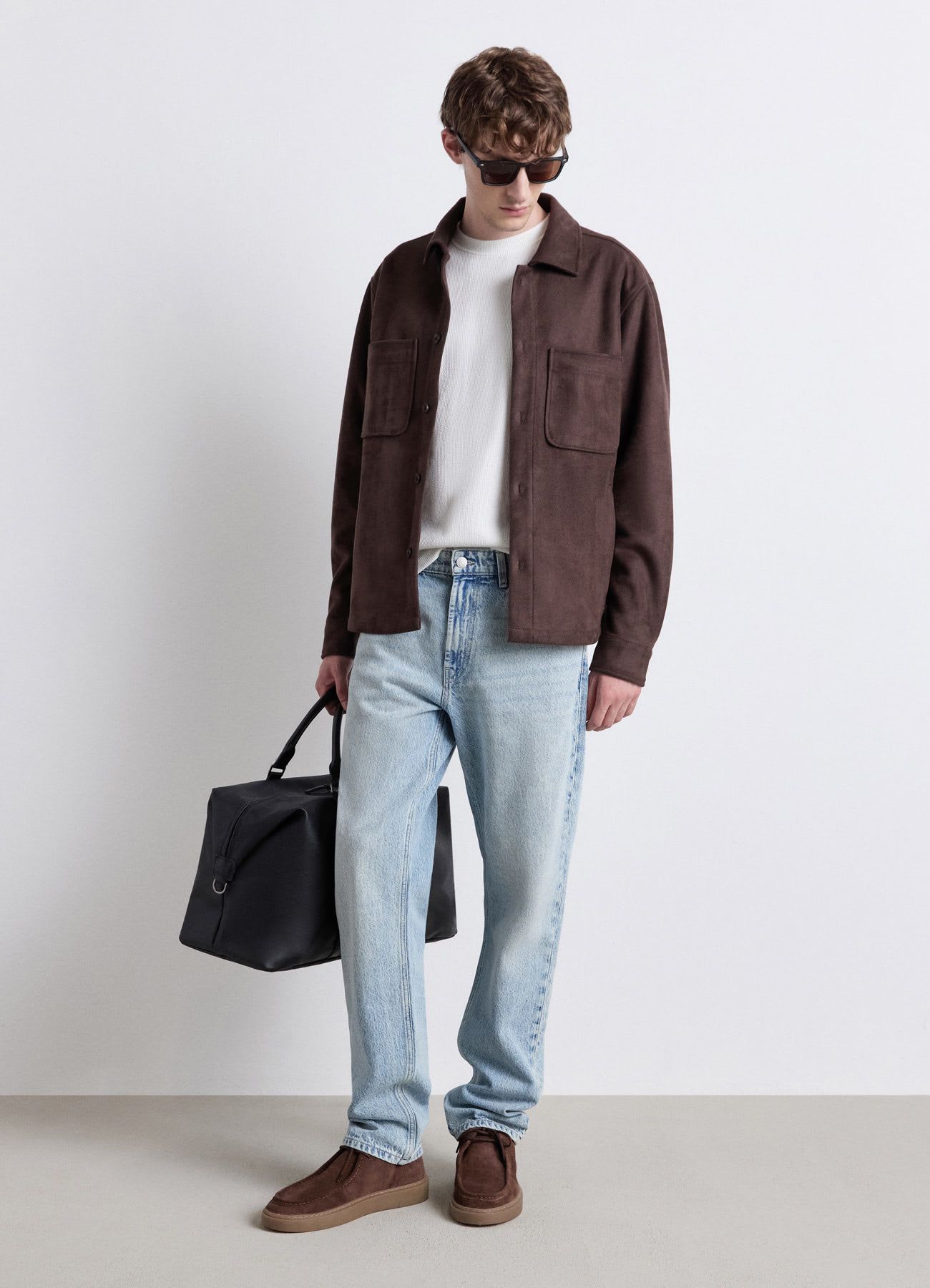 Jeans tapered a tinta unita