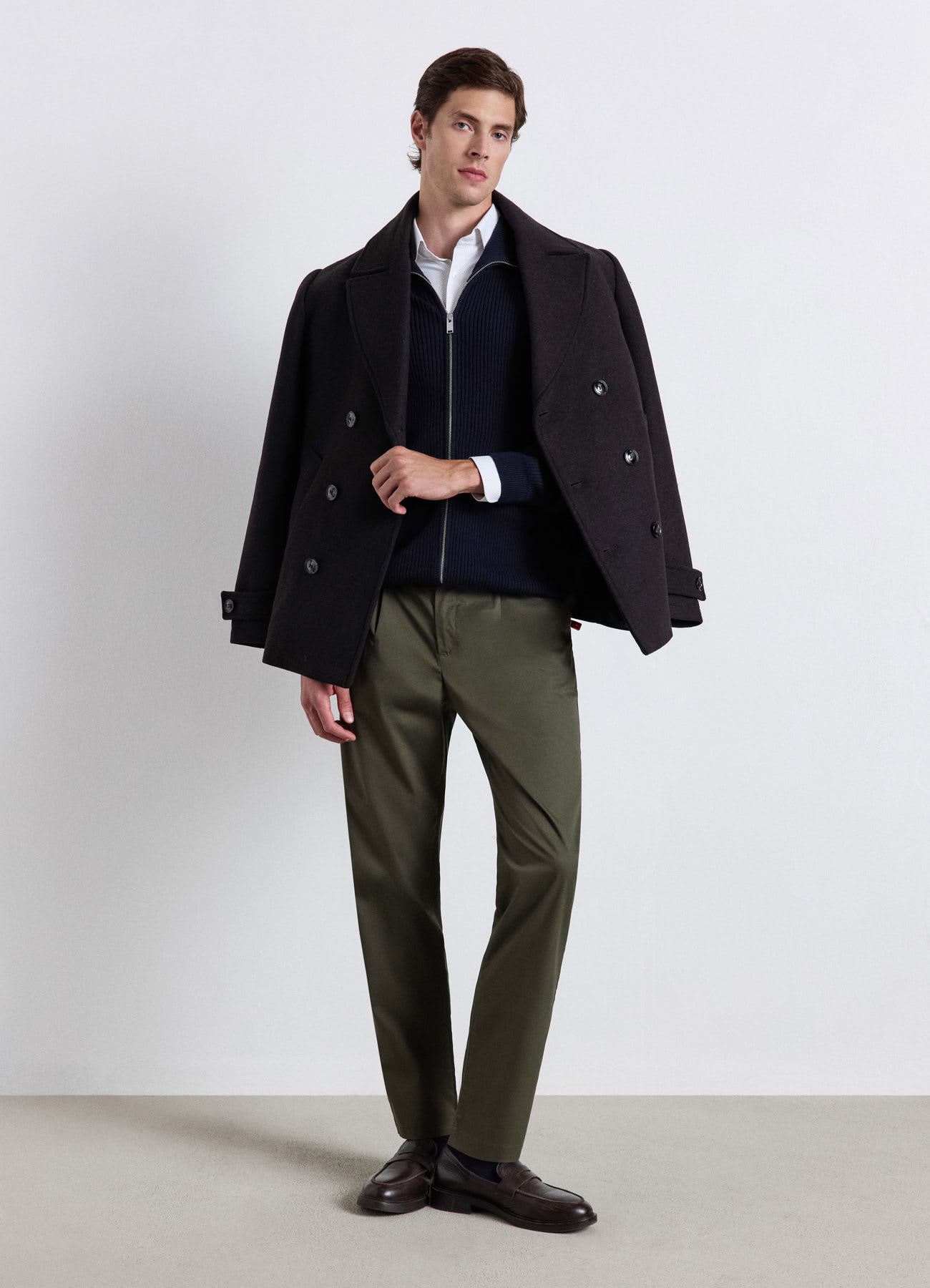 Cardigan a costine con zip e collo alto