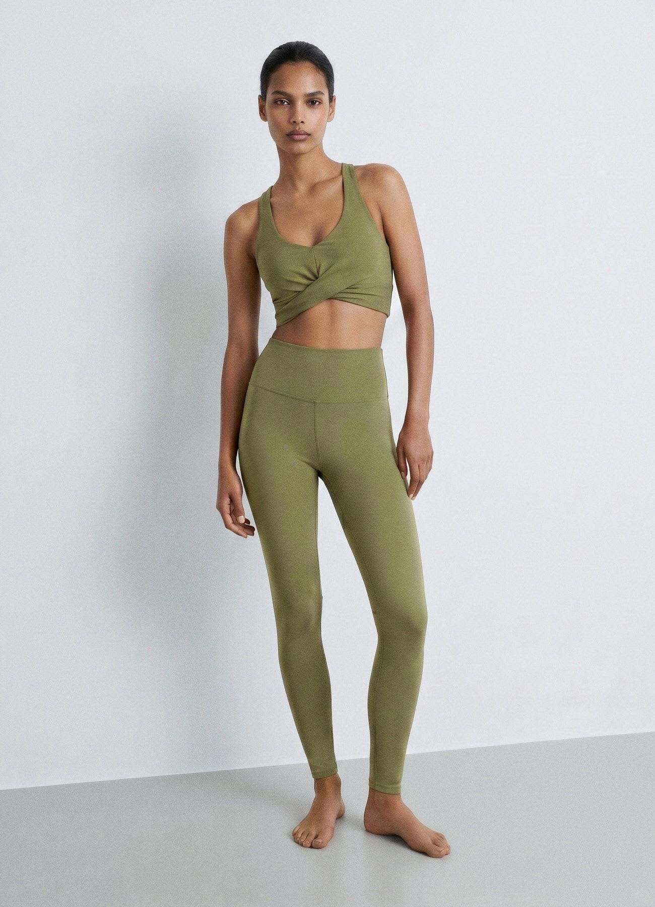Leggings a vita alta con taglio vivo