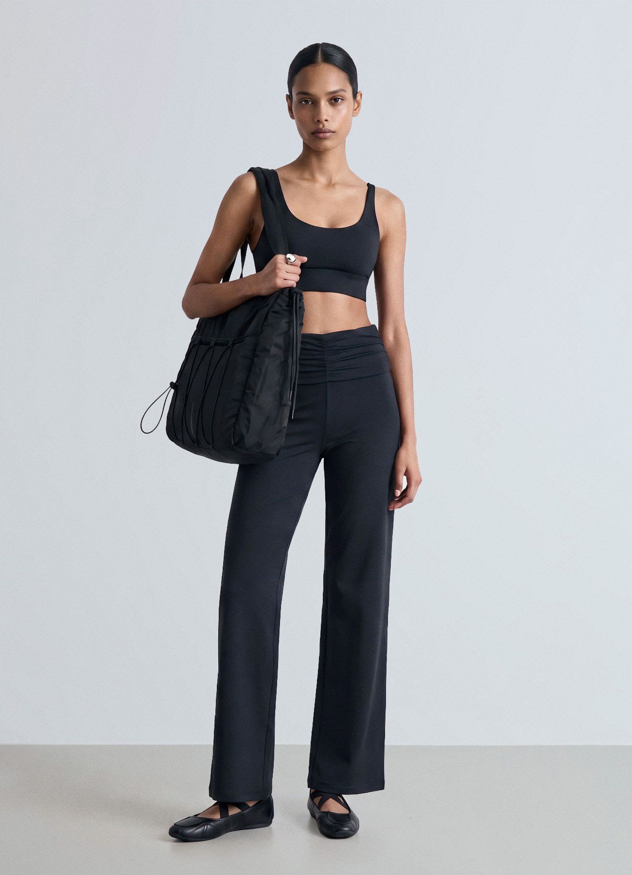 Leggings lunghi a gamba svasata con fascia arricciata
