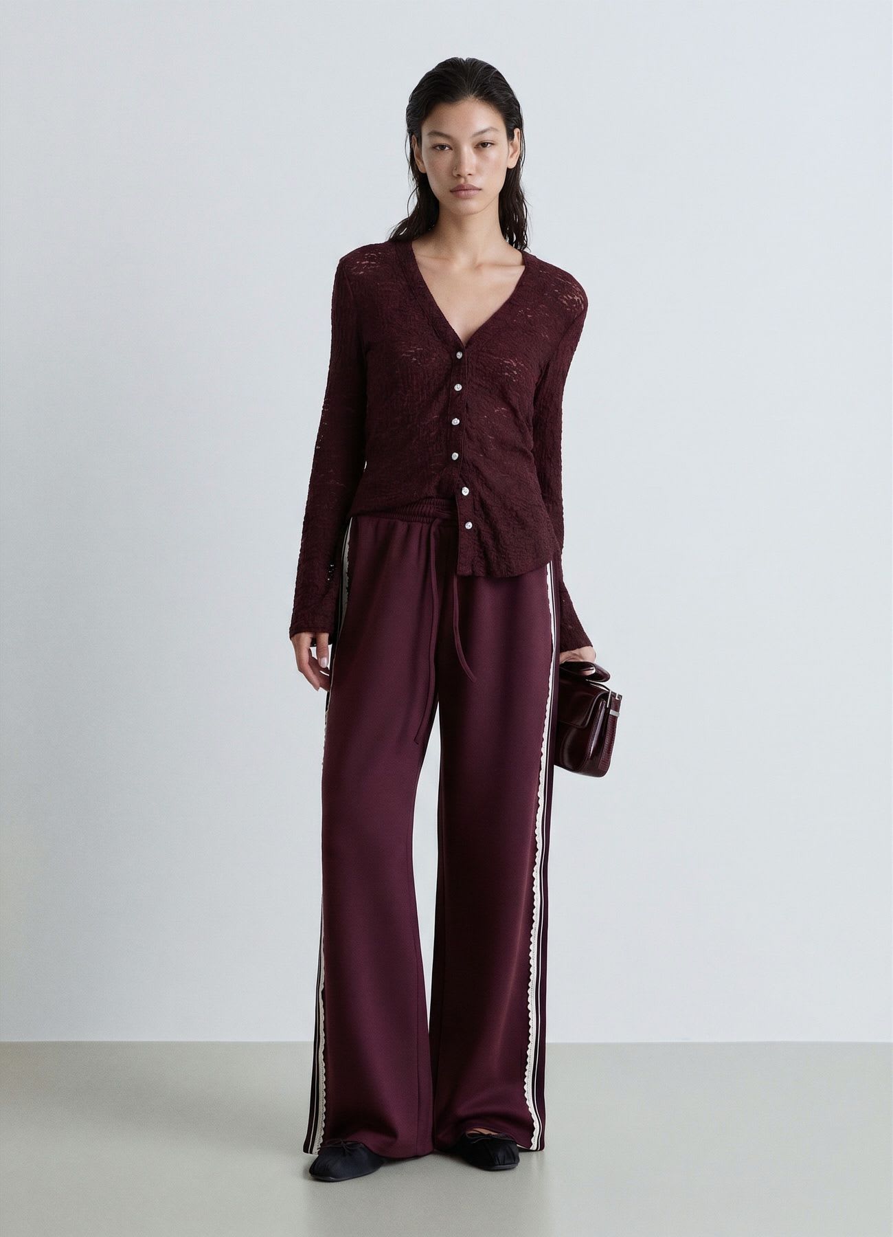 Camicia in pizzo con scollo a V
