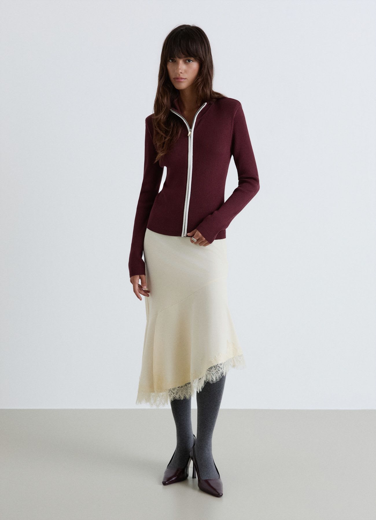 Cardigan a costine con zip e colletto