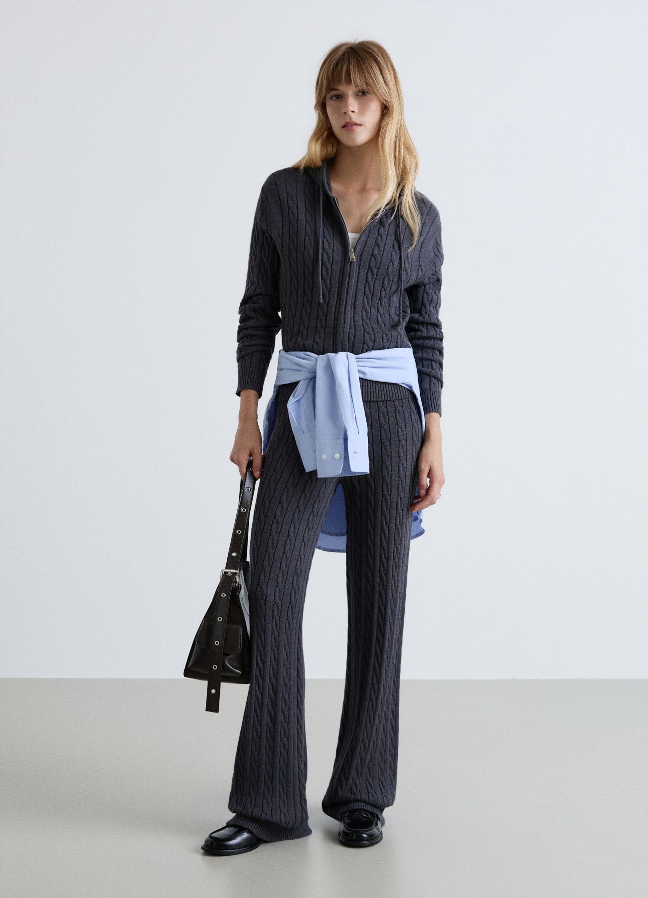 Cardigan con zip e cappuccio a trecce