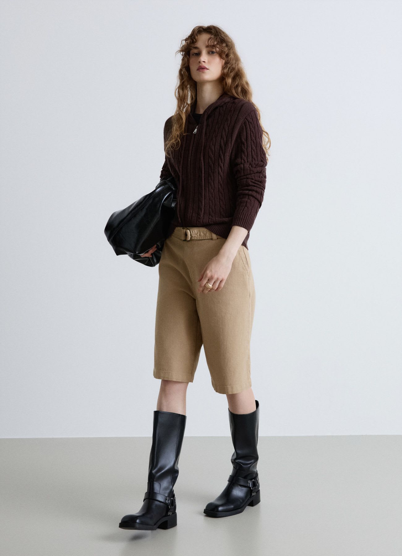 Cardigan con zip e cappuccio a trecce