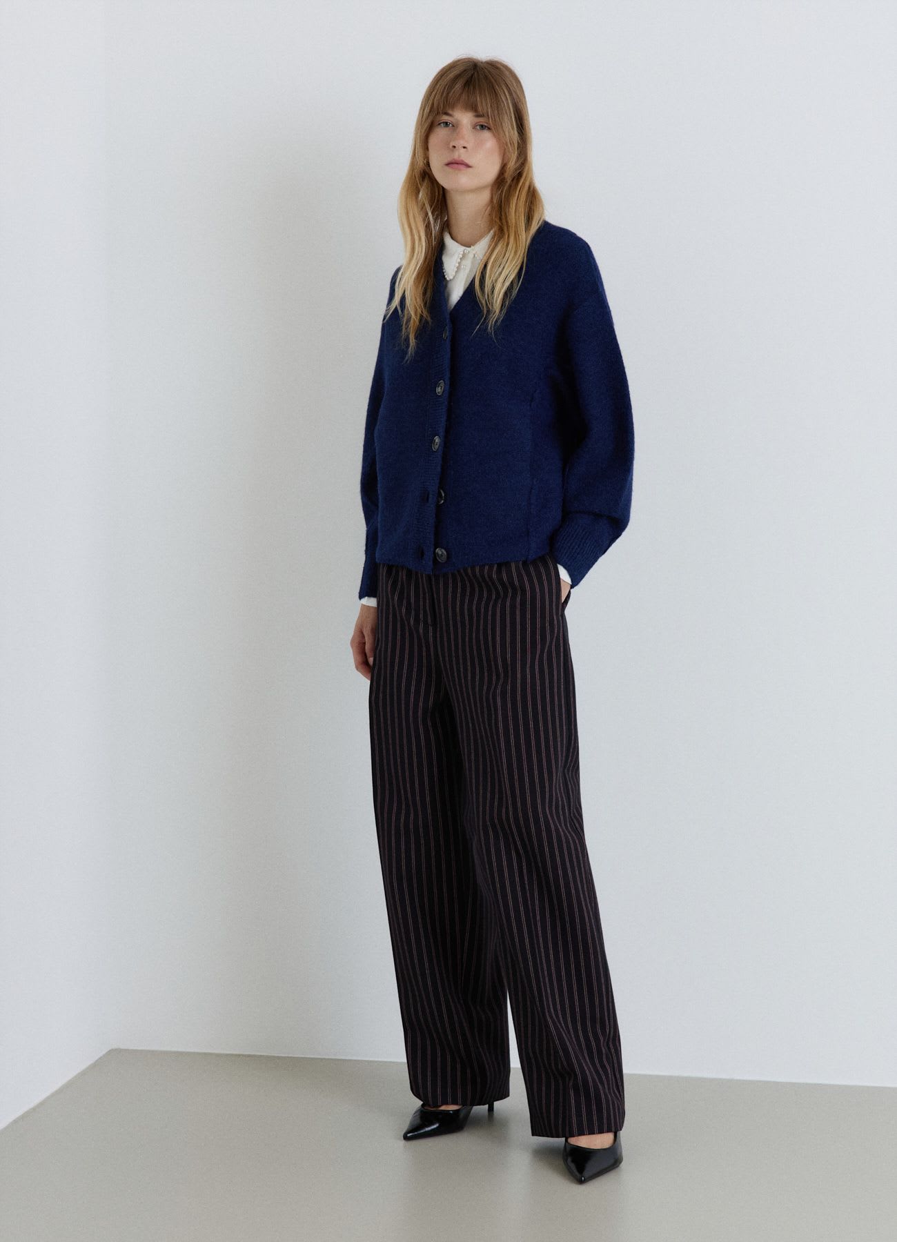 Cardigan in maglia a tinta unita con bottoni