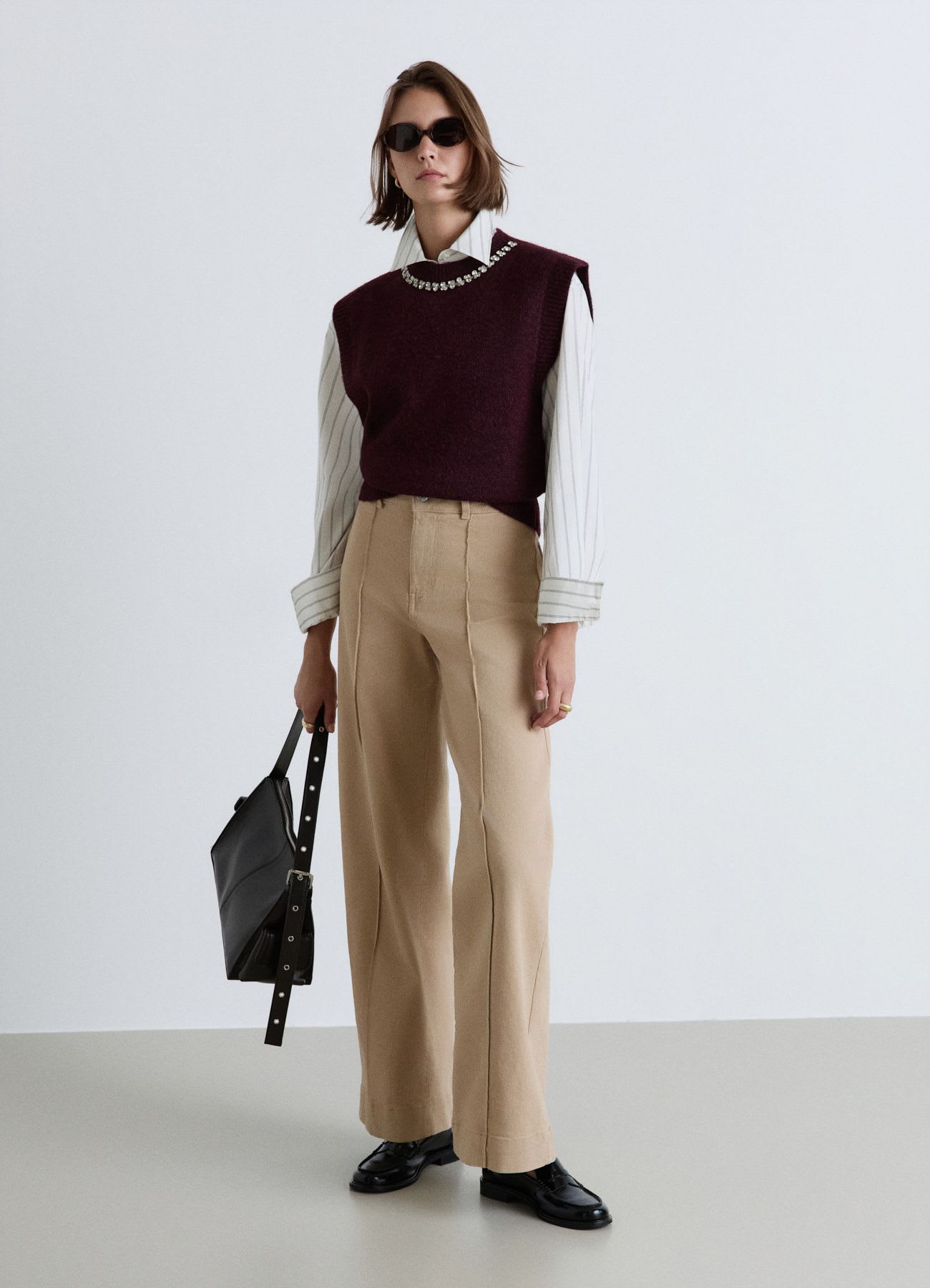 Gilet in maglia con applicazioni strass