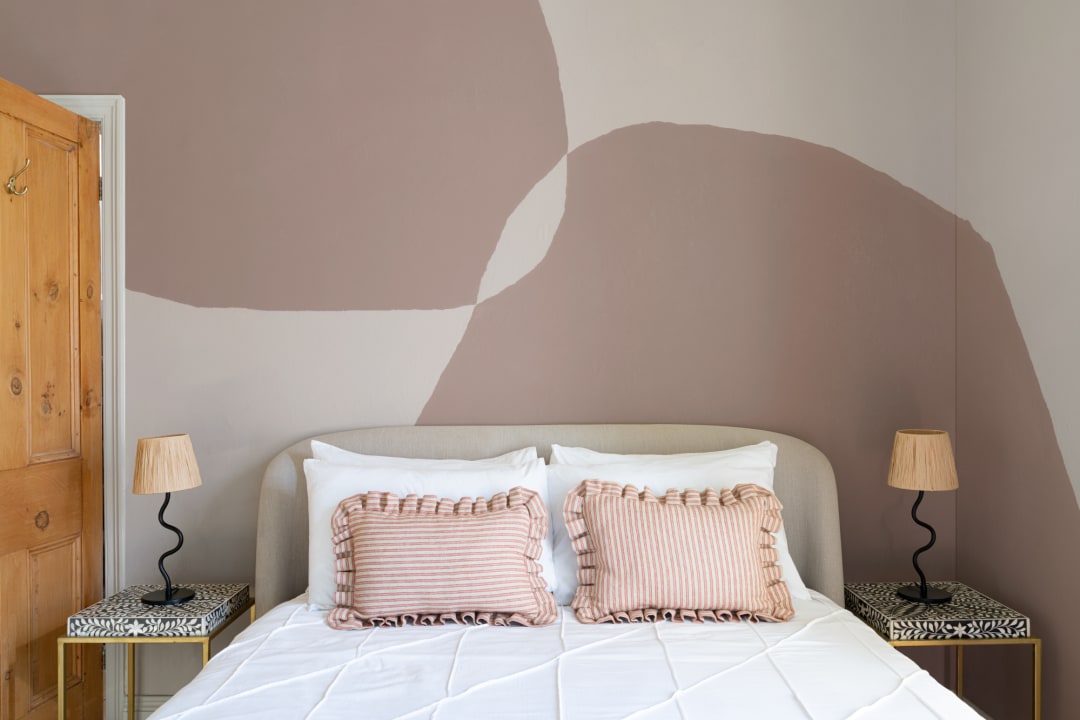 Modern Plaster-Effect Abstract Shapes Wall Mural in Pink Tones