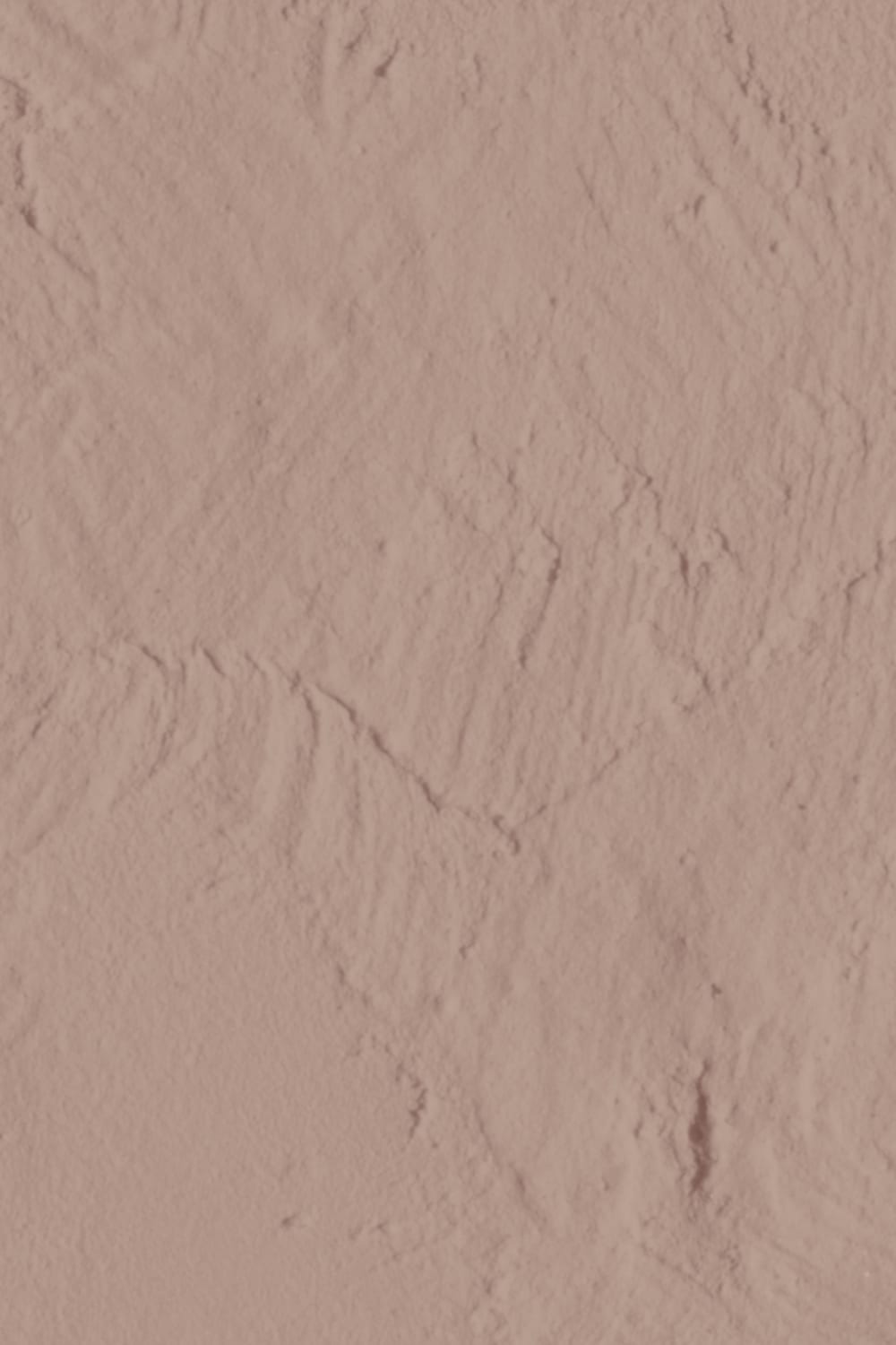 Tekstureret fototapet med gipseffekt i blød pink