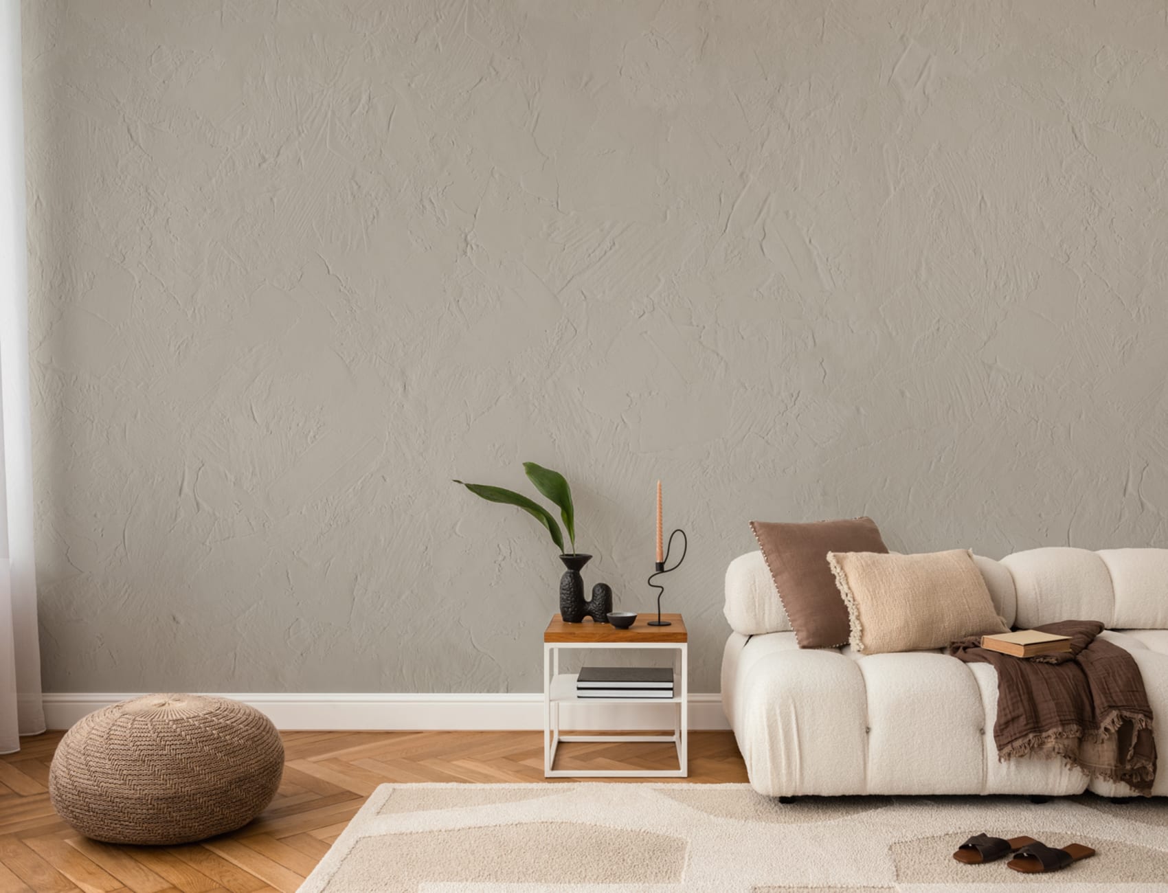 Moderne muurschildering met gipseffect in steengrijs