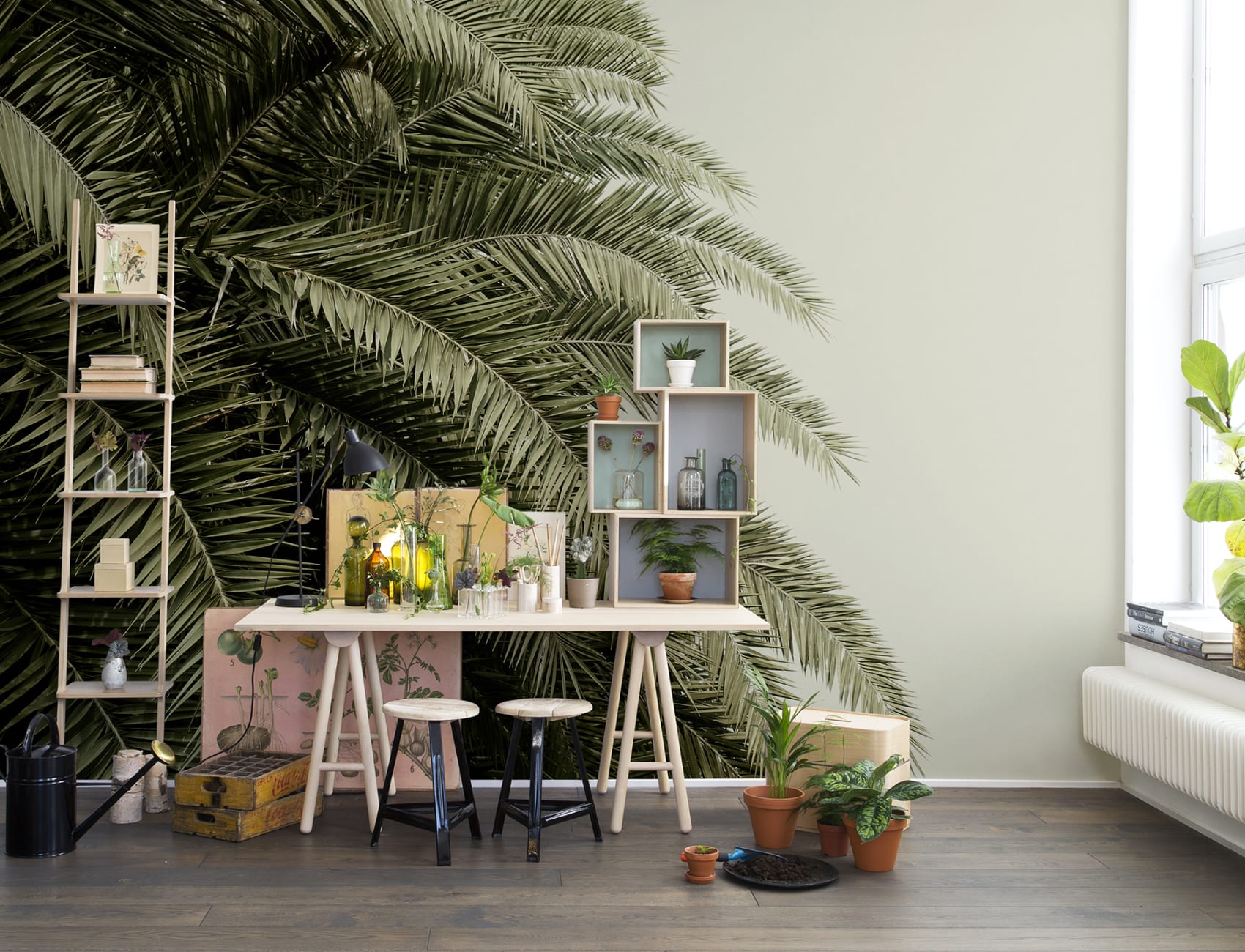 Create a lush green oasis with jungle motif wall mural