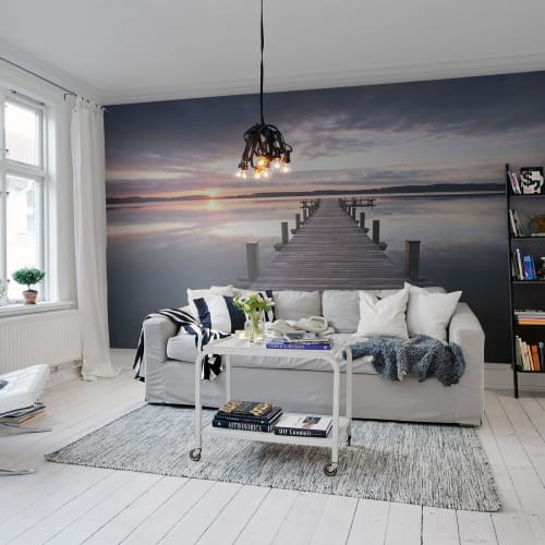 Wall mural with a sunset in the sea