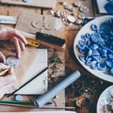 Hands cutting some wax by Annie Spratt on Unsplash