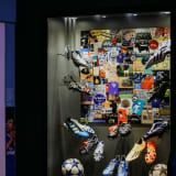 Photo of football memorabilia in a sports museum in London by Virginia Marinova on Unsplash