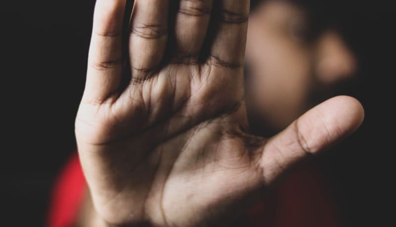 Photo of a man holding his hand up indicating stop by Salman Hossain Saif on Unsplash