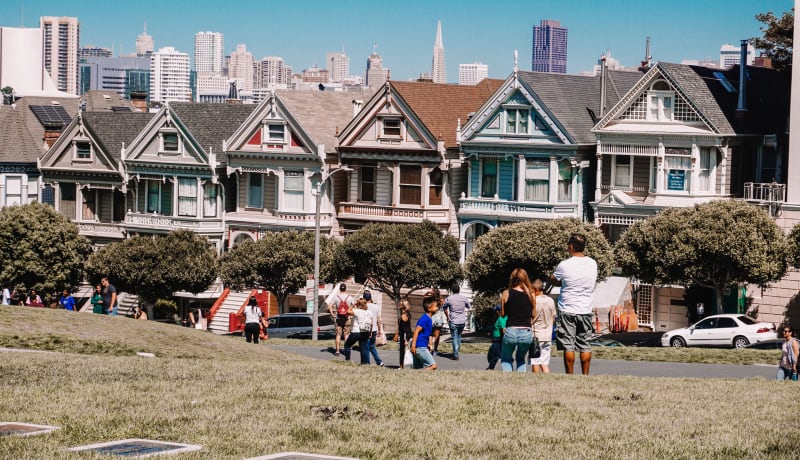 Photo of people in front of a San Francisco neighborhood by Emily-Jo Sutcliffe on Unsplash