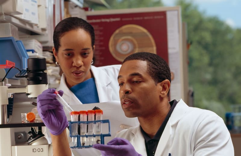 Photo of Scientists in a medical lab by National Cancer Institute on Unsplash
