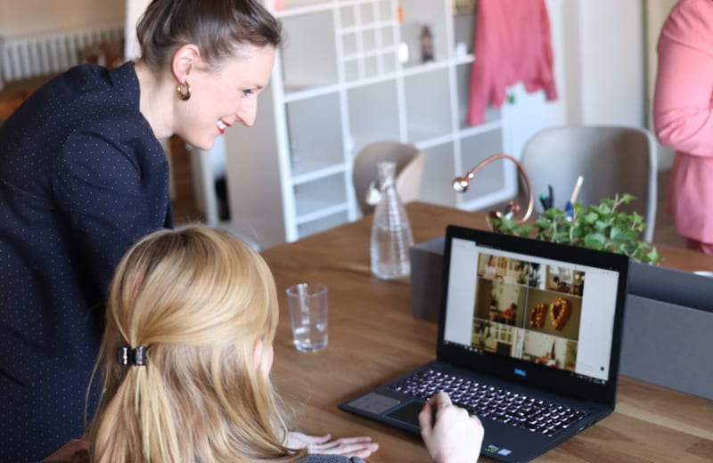 Photo of two women looking at a laptop screen by CoWomen on Unsplash