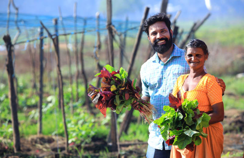 A man and a woman farmer cultivating the field by Sooraj Perambra on Unsplash