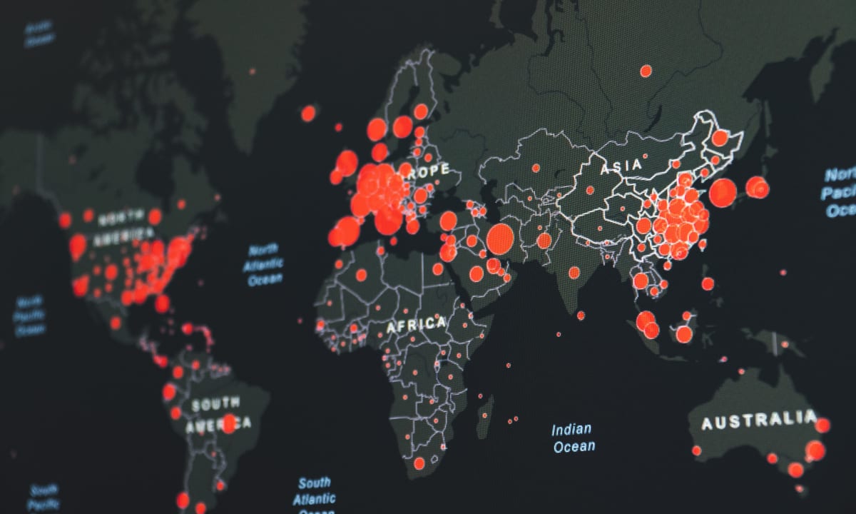 Photo of world map with red circles by Martin Sanchez on Unsplash