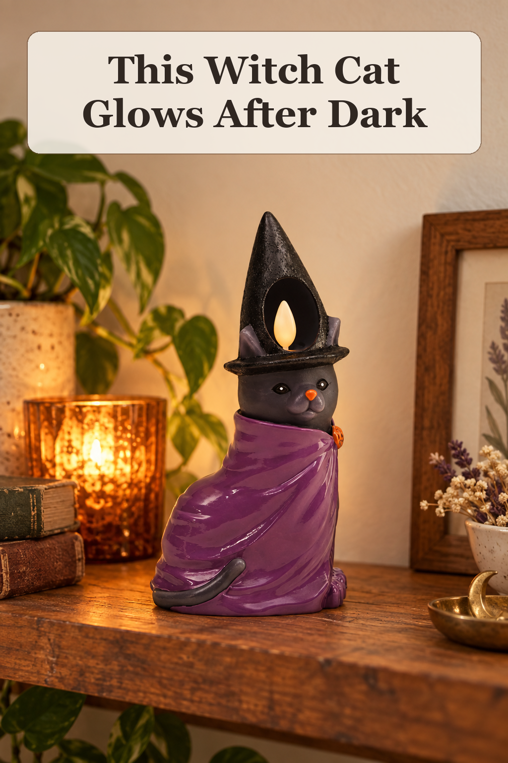 Luminara Witch Cat Flameless Candle styled in a warm, lived-in Halloween setting