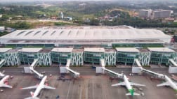 Aerial view of an airport terminal and aircraft