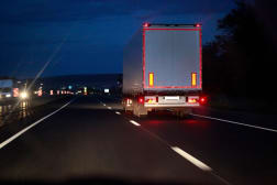 Freight truck on a highway at night