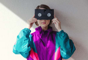 VHS Kid holding a VHS