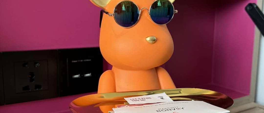 A Little Bear Holding a Tray for Your House Keys