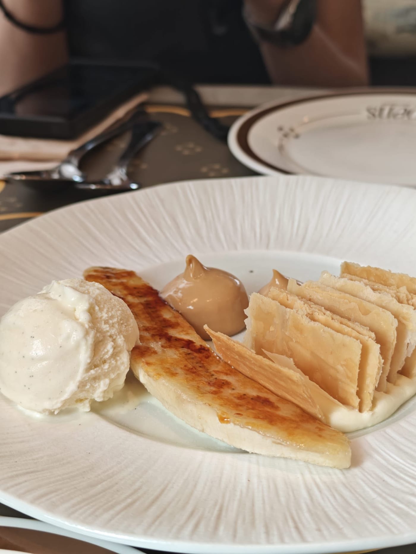 Millefeuille (270.-): the highlight here is the vanilla ice cream with caramel ganache. The Pistachio Cake (180.-) photographs beautifully, but there's almost no pistachio flavor to speak of — the meringue and berry powder steal the whole show.
