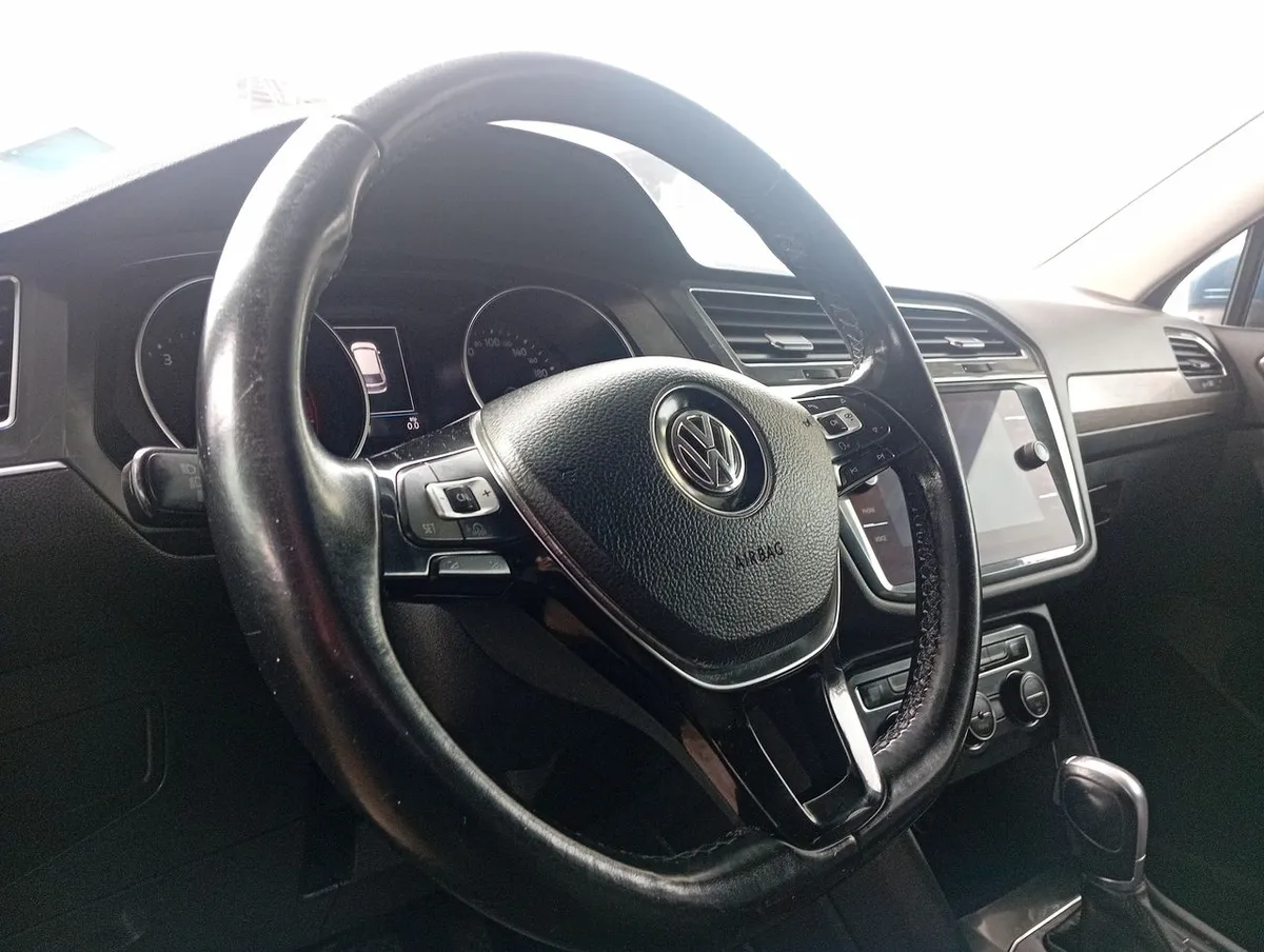Volkswagen Tiguan 1.4 Tsi Comfortline 4x2 7a 150hp At 5p año 2018
