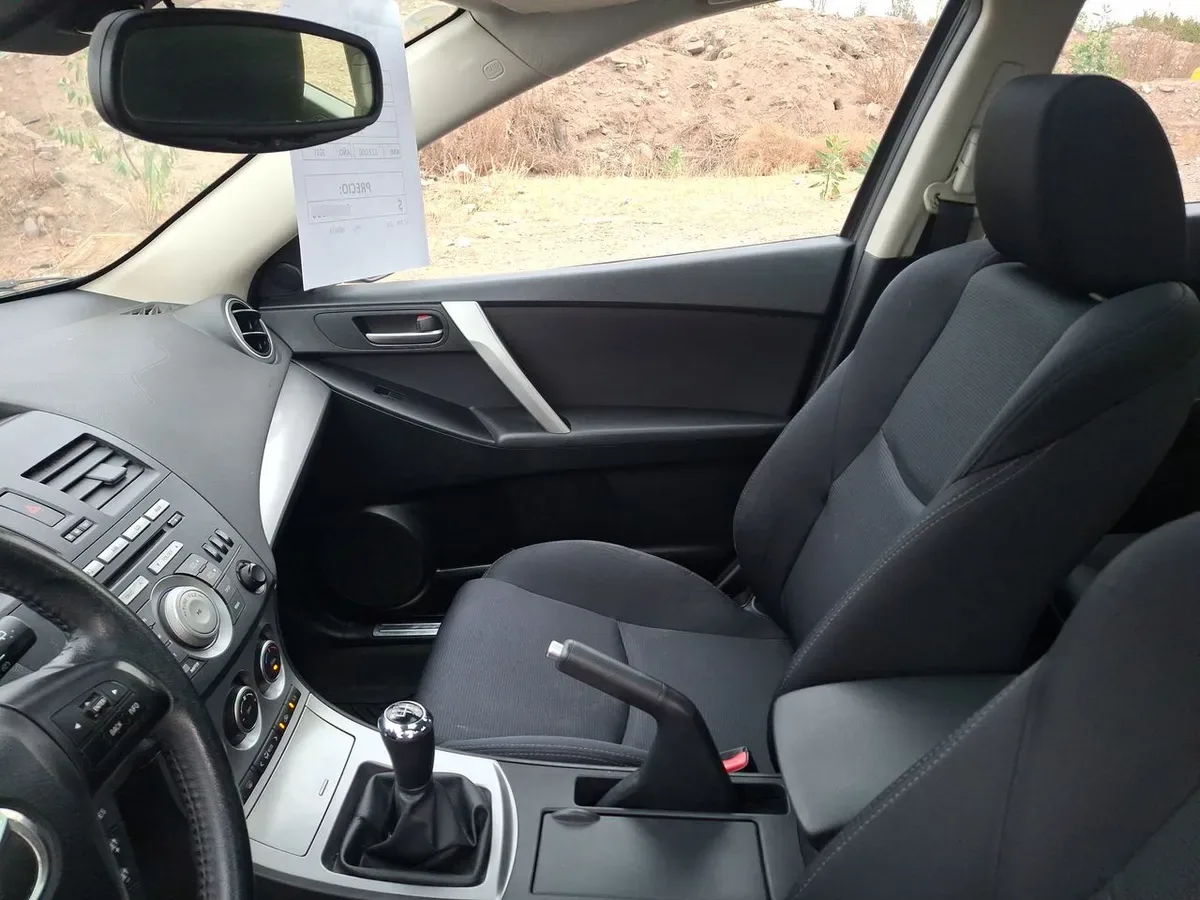 Mazda 3 2.0 Sport R 4x2 Te Mt 5p año 2011