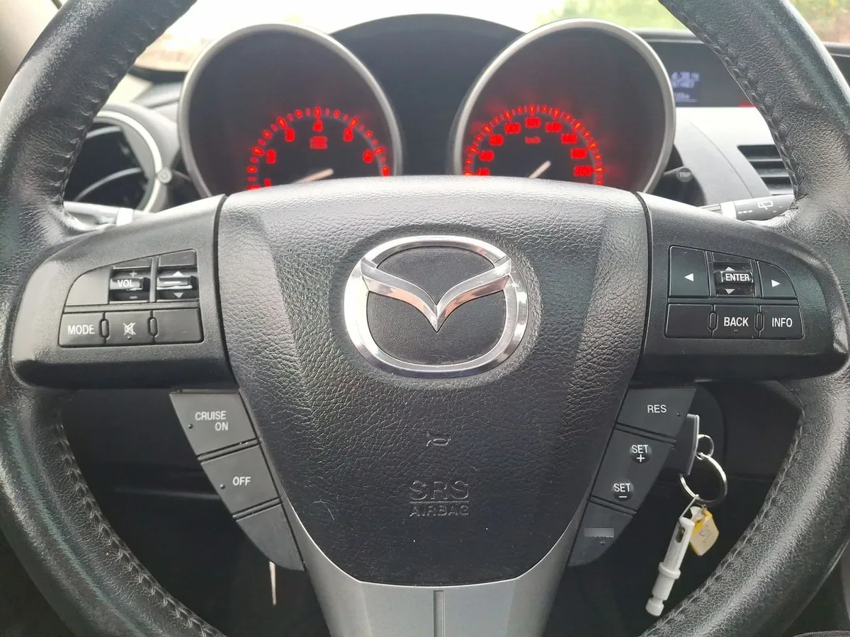 Mazda 3 2.0 Sport R 4x2 Te Mt 5p año 2011