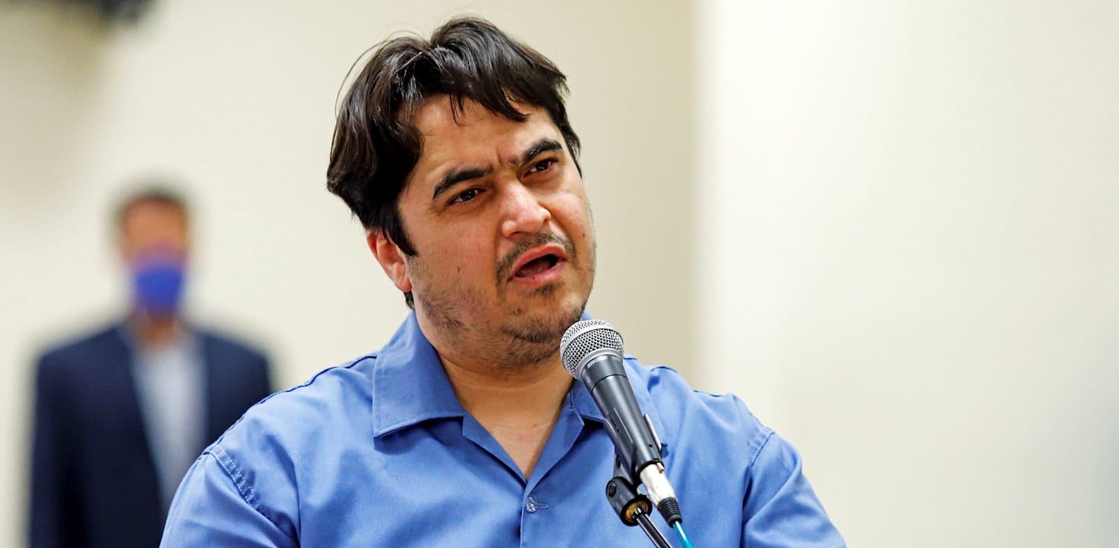 העיתונאי רוהולה זאם, במשפטו ביוני / צילום: Reuters, Mizan News Agency/WANA