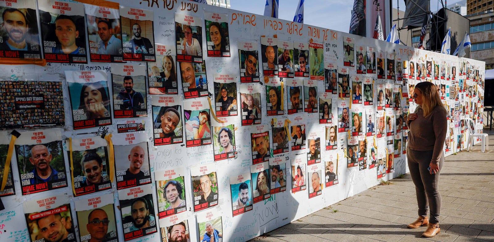 תמונות החטופים מה-7 באוקטובר / צילום: Reuters, SUSANA VERA