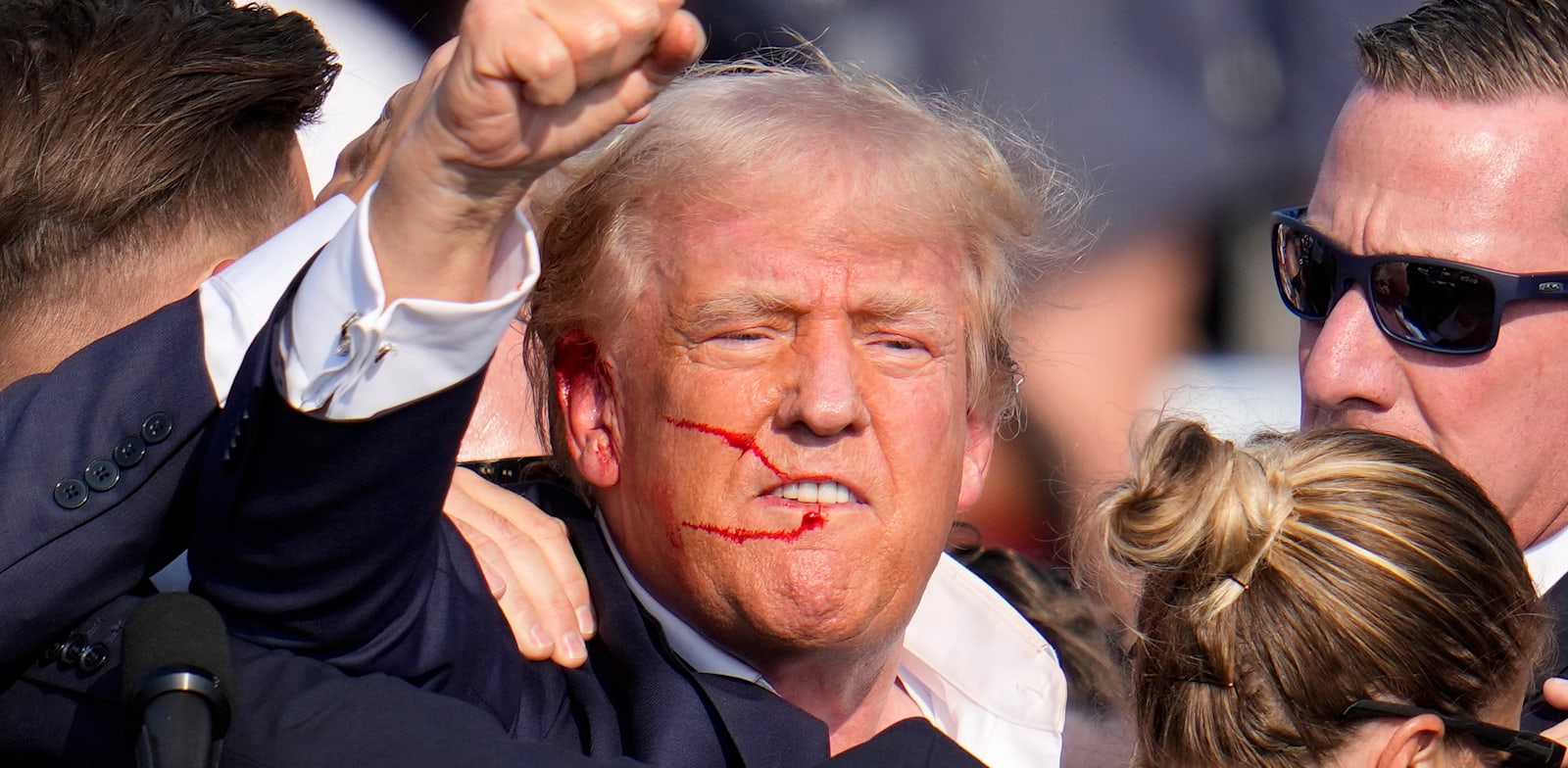 טראמפ לאחר ניסיון ההתנקשות. כישלון מבעית של השירות החשאי / צילום: ap, Gene J. Puskar