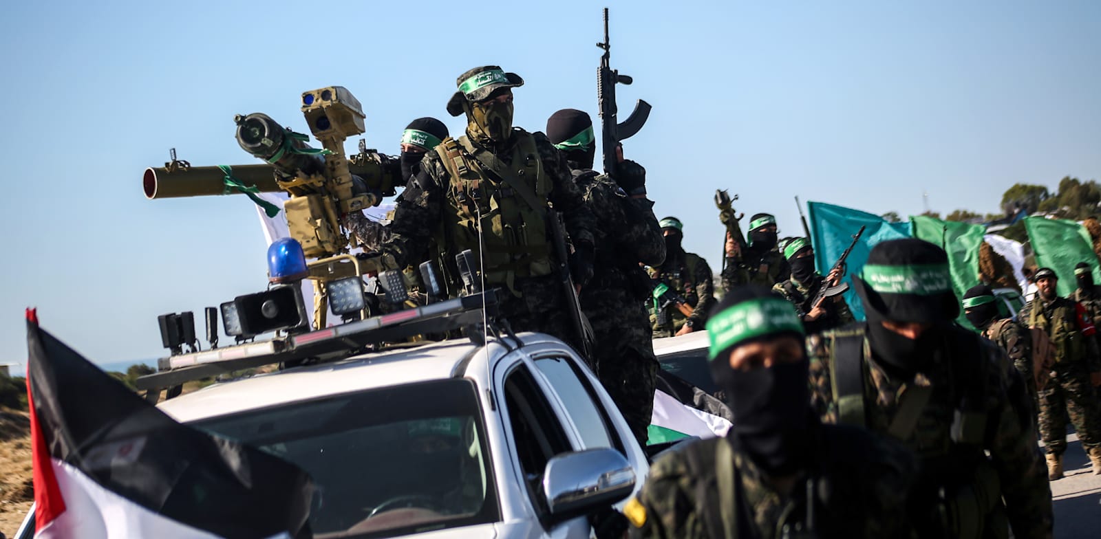 גדודי עז א־דין אל־קסאם במצעד בתוך רצועת עזה / צילום: Reuters, Yousef Masoud