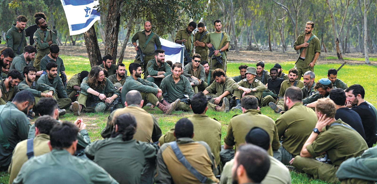 מילואימניקים שיצאו מרצועת עזה. ''עומק ויצירתיות שאין לסדירים'' / צילום: Associated Press, Ariel Schalit