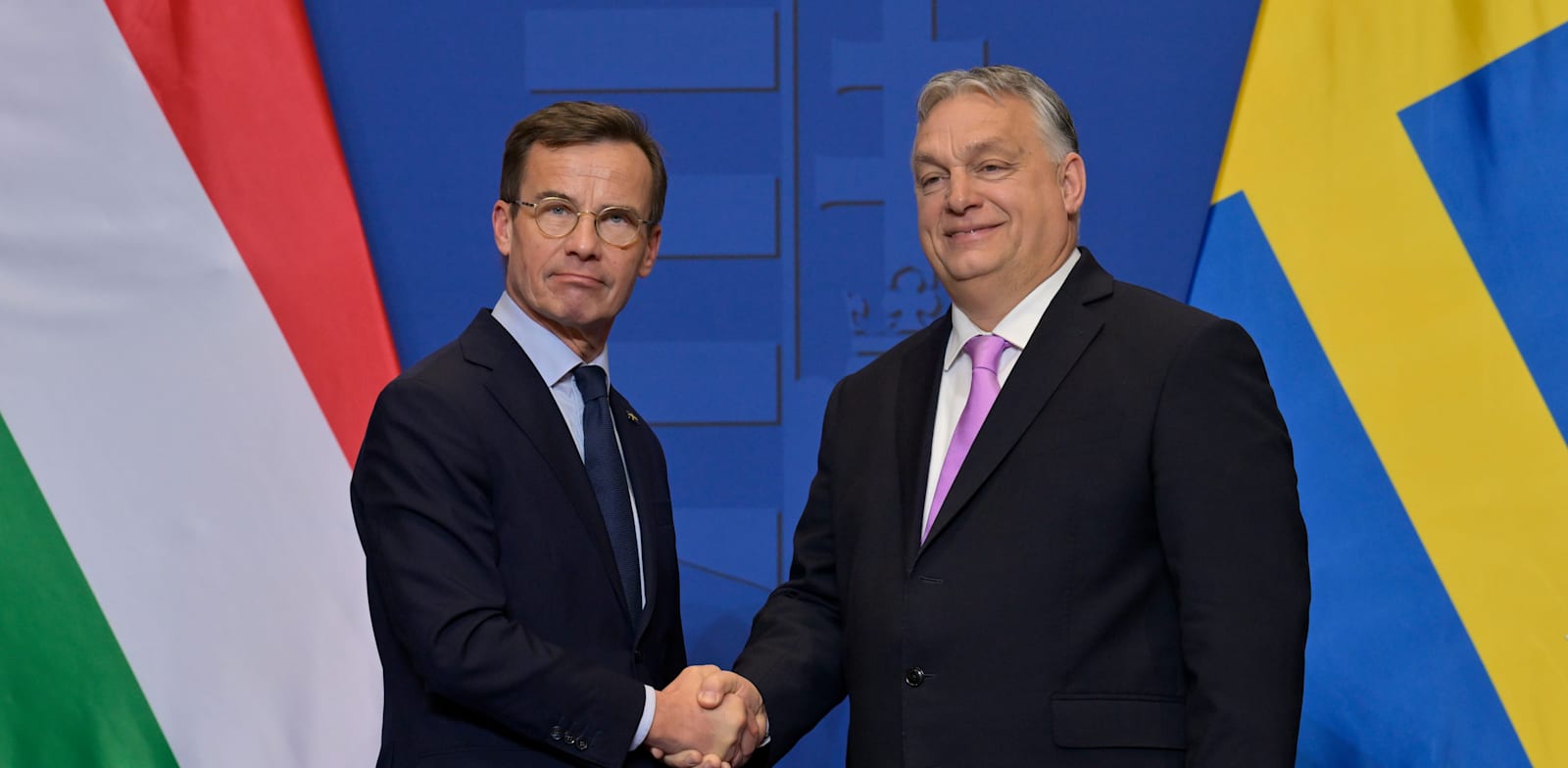 "ראש ממשלת טורקיה ויקטור אורבן וראש ממשלת שבדיה אולף כריסטנסן / צילום: Associated Press, Denes Erdos"