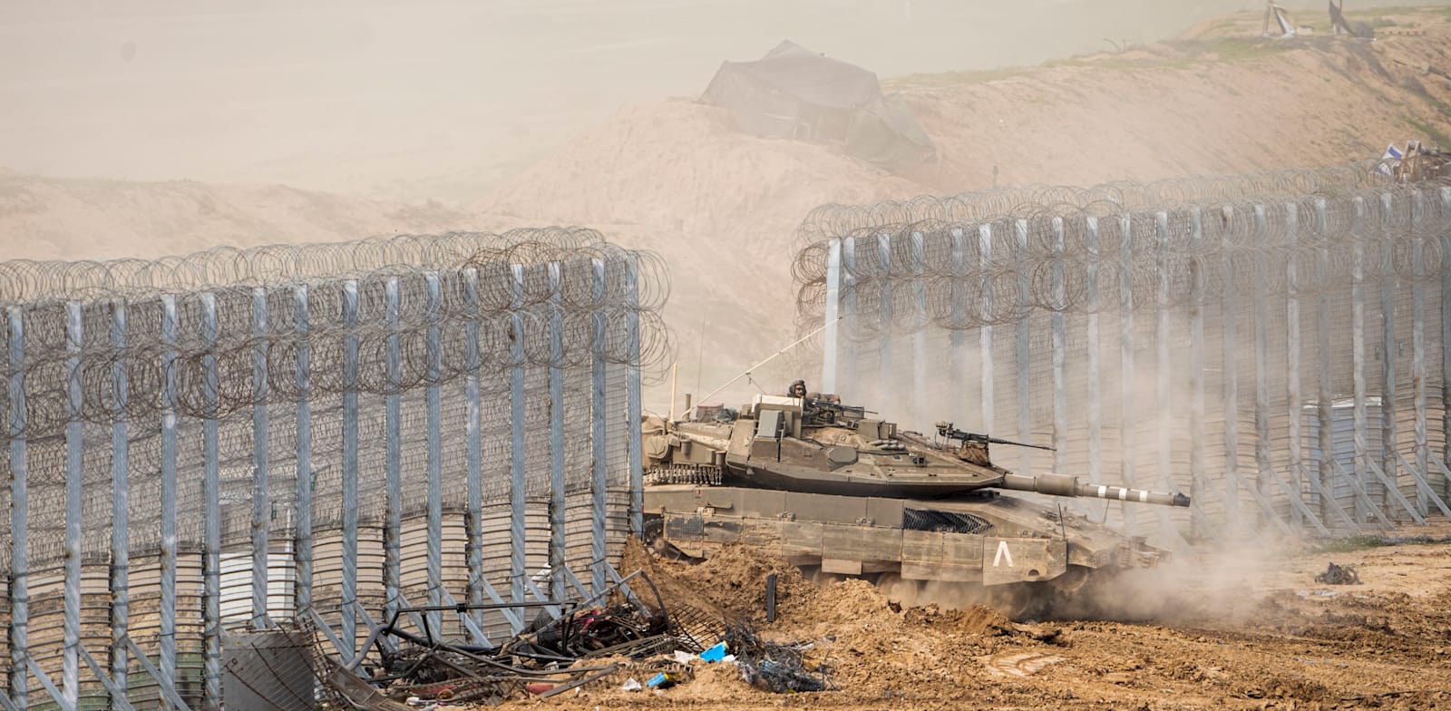 ב-OECD מעריכים כי המלחמה תוביל לפגיעה בתוצר בישראל בהמשך השנה / צילום: ap, Ariel Schalit