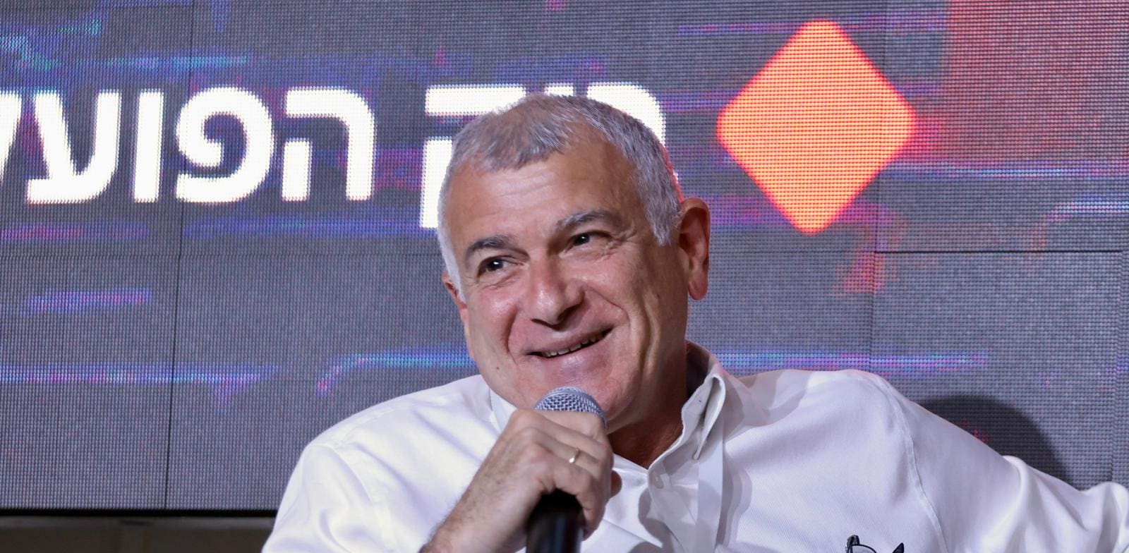 "מנכ''ל מבנה, עוזי לוי, בכנס הנדל''ן של EY / צילום: כדיה לוי"