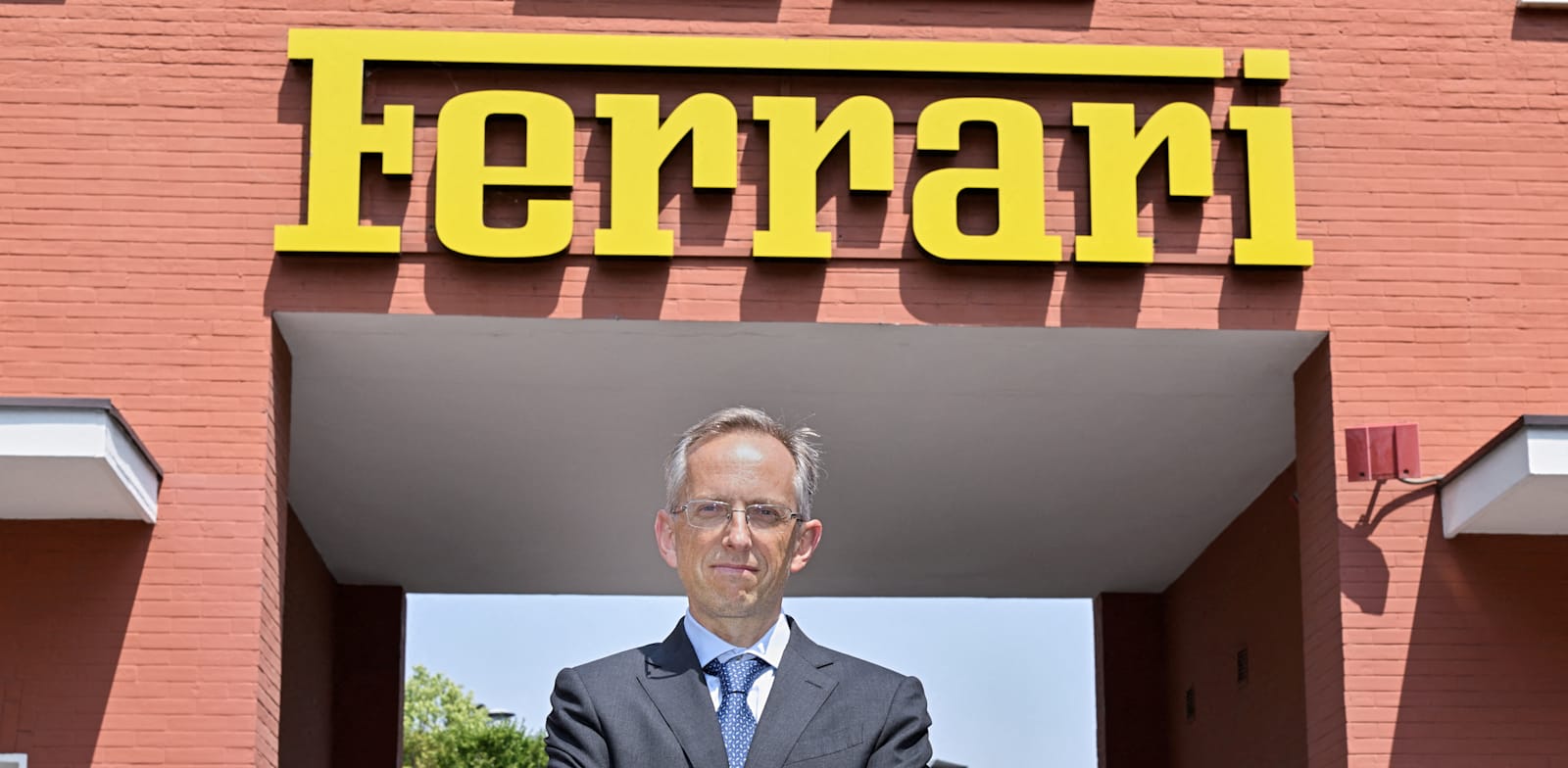 מנכ''ל פרארי, בנדטו ויניה / צילום: Reuters, FLAVIO LO SCALZO