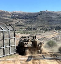 נגמ''ש ישראלי בדרכו לסוריה / צילום: Reuters, Avi Ohayon