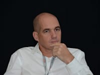 עפר גרינבאום, מנכ''ל אי.בי.אי חיתום / צילום: איל יצהר