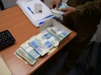 מזומן שנתפס על ידי משטרת ישראל. יש אתגרים באכיפה / צילום: דוברות משטרת ישראל