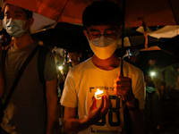 מפגינים בכיכר החירות בטאיפיי ביום השנה ה-34 לציון קורבנות דיכוי ההפגנות הפרו דמוקרטיות בשנת 1989 בבייג'ין / צילום: Reuters, ANN WANG